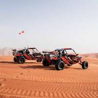tourists exploring the ras al khaimah desert on a powerful dune buggy rentals on a dune buggy tour ras al khaimah